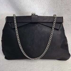 Vintage timeless black satin clutch purse with bow, silver tone chain & clasp.